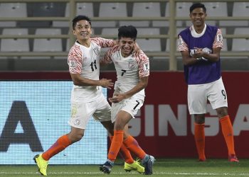 Sunil Chhetri (L) celebrates with Anirudh Thapa after the latter’s goal against Thailand in Abu Dhabi, Sunday
