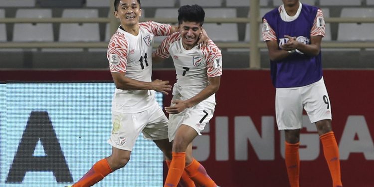 Sunil Chhetri (L) celebrates with Anirudh Thapa after the latter’s goal against Thailand in Abu Dhabi, Sunday