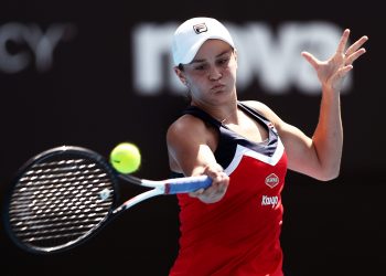 Ashleigh Barty plays a shot against Elise Mertens in Sydney, Thursday