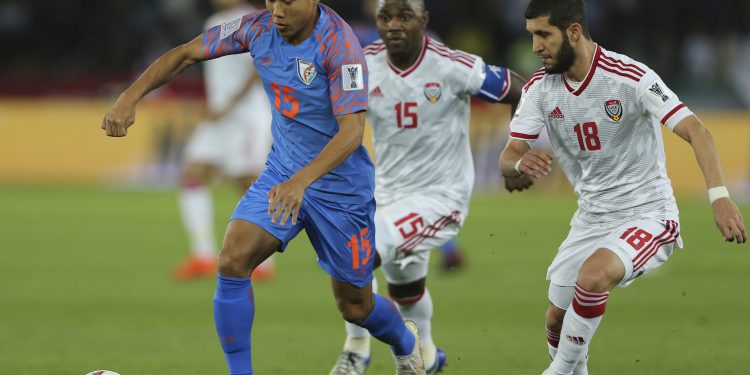 India’s Udanta Singh (in Blue) tries to control the ball as two UAE defenders chase him during the AFC Asian Cup game at Abu Dhabi, Thursday night