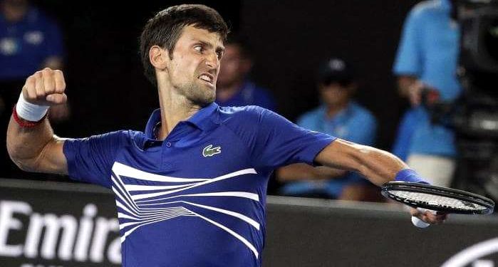 Serbia's Novak Djokovic celebrates after winning a point against Mitchell Krueger. (AP)