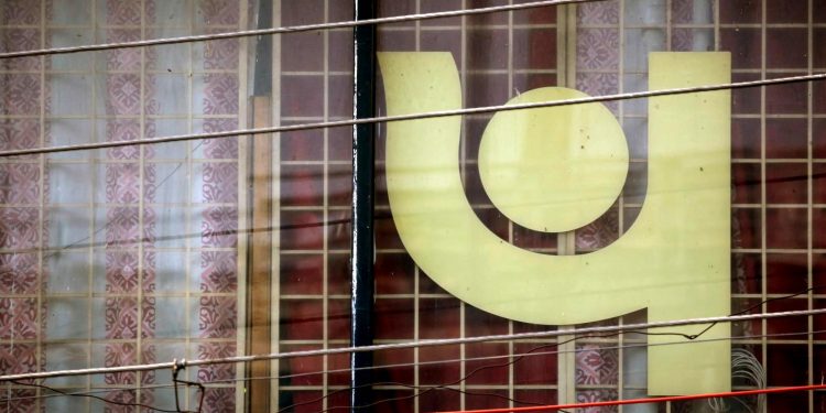 The logo of Punjab National Bank (PNB) is seen on a branch office window in New Delhi, India, February 27, 2018. (REUTERS)