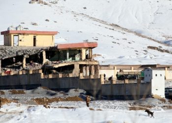 In this Monday, Jan. 21, 2019, photo, Afghan security forces inspect the site of a Taliban attack in Maidan Shar, capital of Maidan Wardak province, east of Kabul, Afghanistan. Afghan official said Tuesday, Jan. 22, 2019, scores of people mostly military personals were killed in the Taliban assault on a military base and a pro-government militia training center a day earlier in the province. (AP)