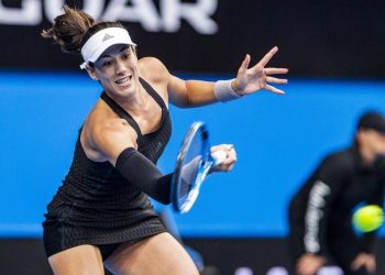 Gabrine Muguruza in action against Alize Cornet at Perth Friday
