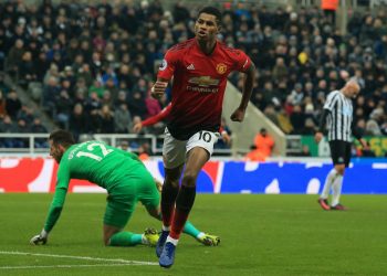 Marcus Rashford wheels away in celebration after scoring Manchester United’s second goal against Newcastle United at St James Park, Wednesday 