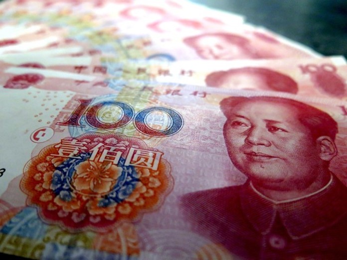 Chinese yuan edges higher to 6.7472 against US dollar