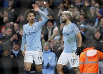 Leroy Sane (L) and Sergio Aguero celebrate after the latter’s goal against Liverpool at Etihad Stadium, Thursday
