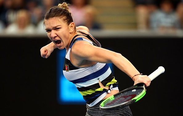 Simona Halep reacts after beating Venus Williams at the Australian Open, Saturday 