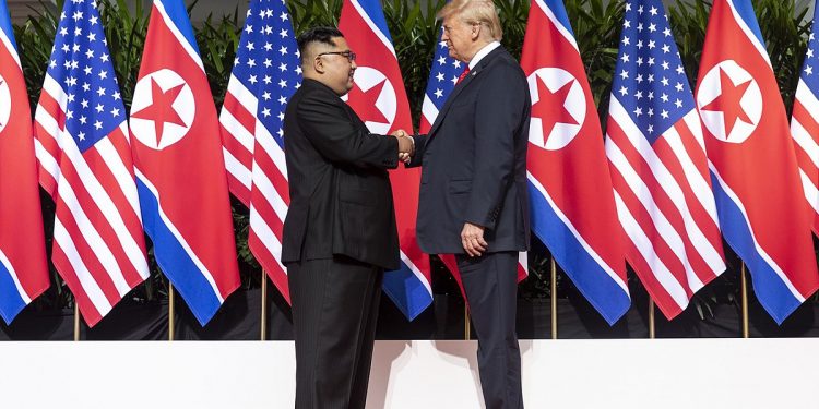 Kim and Trump shaking hands at the red carpet during the DPRK–USA Singapore Summit (WIKI)