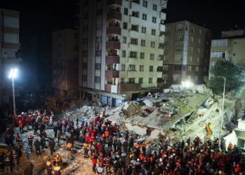Dozens of rescuers have been working at the site with a crane lifting huge blocks of concrete to clear the rubble and search for survivors (AFP)