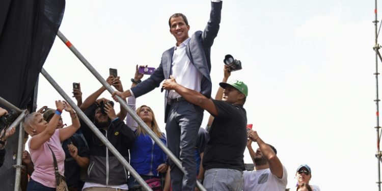 Opposition leader Juan Guaido Guaido, seen here at a gathering of supporters in Caracas on February 2, wants to set up a transitional government and hold new elections in Venezuela