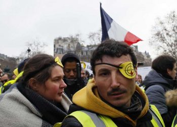 A wounded protester attends the yellow vests demonstration Saturday, Feb. 2, 2019 (AP)