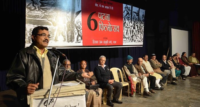 Patna: Anand Teltumbde addresses at the inauguration of Patna Film Festival on Dec 5, 2014. (IANS)