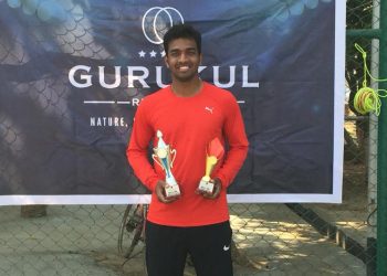 Ansu Kumar Bhuyan poses with his trophies