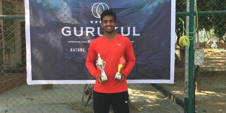 Ansu Kumar Bhuyan poses with his trophies