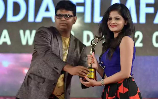 Deepika receiving Award