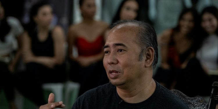 Rodgil Flores set up the first of a handful of Philippine beauty boot camps that have helped transform the nation's pageant fortunes (AFP)