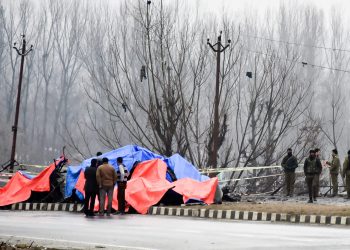 Lethpora: Security agencies inspect the site of suicide bomb attack at Lethpora area, in Pulwama district of south Kashmir, Friday, Feb. 15, 2019. At least 37 CRPF personnel were killed yesterday in one of the deadliest terror attacks in Jammu and Kashmir when a Jaish suicide bomber rammed a vehicle carrying over 100 kg of explosives into their bus in Pulwama district. (PTI Photo/S Irfan)(PTI2_15_2019_000036B)