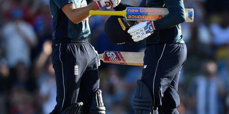 Joe Root (L) congratulates Jason Roy on his century against West Indies in Bridgetown, Wednesday

      