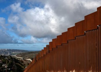 A section of the steel wall on the US - Mexico border near San Diego, California (AFP)