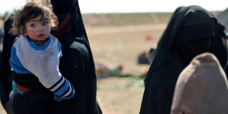 In the past two months, more than 37,000 people, mostly wives and children of IS fighters, have fled into SDF-held areas (AFP)