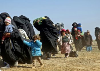 SDF spokesman Mustefa Bali said on Tuesday that 600 civilians had fled the combat zone overnight and the Syrian Observatory for Human Rights said another 350 made it out that day (AFP)