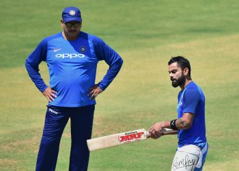 Indian captain Virat Kohli along with coach Ravi Shastri during their practice session at Chinnaswamy Stadium, Tuesday   