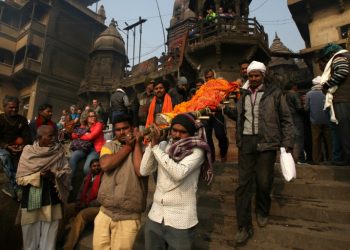 They arrive in battered cars, on crutches and sometimes on a stretcher barely able to breathe -- but salvation is close for thousands of Hindus who go to the holy city of Varanasi each year to die (AFP)