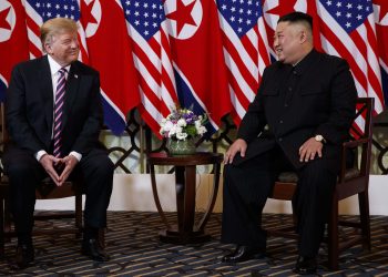 Donald Trump and Kim Jong Un share a light moment Wednesday evening at Hanoi