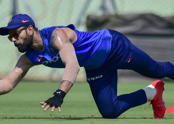 Indian skipper Virat Kohli takes a tumbling while going through the fielding drills