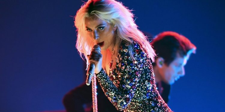 When the moment came for Lady Gaga to belt out her award-winning song "Shallow" at the Grammys, she did not disappoint (AFP)