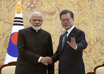 Prime Minister Narendra Modi and Korean President Moon Jae-in pose for the shutterbugs in Seoul, Friday