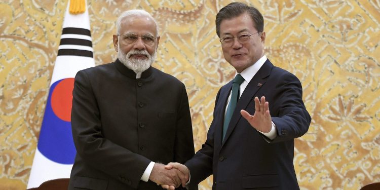 Prime Minister Narendra Modi and Korean President Moon Jae-in pose for the shutterbugs in Seoul, Friday