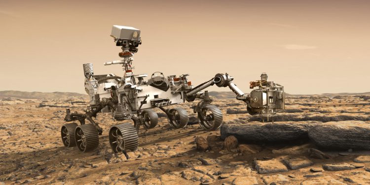 This artist's rendition depicts NASA's Mars 2020 rover studying a Mars rock outrcrop. (NASA/AP)