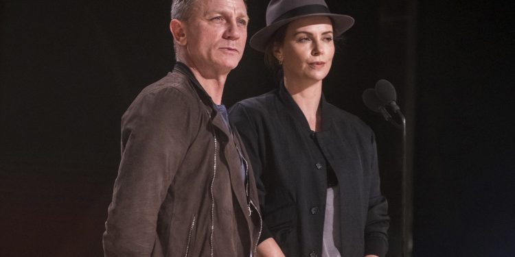 Daniel Craig and Charlize Theron appear during rehearsals for the 91st Academy Awards in Los Angeles Saturday, Feb. 23, 2019. (AP)