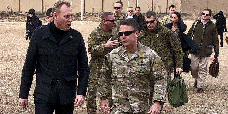 Acting Defense Secretary Pat Shanahan, left, arrives in Kabul, Afghanistan, Monday morning, Feb. 11, 2019, to consult with Army Gen. Scott Miller, right, commander of U.S. and coalition forces, and senior Afghan government leaders. The unannounced visit is the first for the acting secretary of defense, Pat Shanahan. He previously was the No. 2 official under Jim Mattis, who resigned as defense chief in December. (AP)