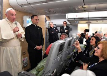 Pope tamps down Maduro's hopes for Vatican intervention, marries couple in plane