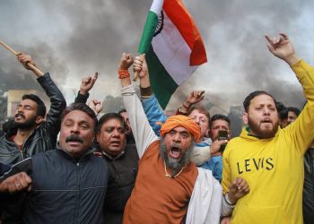 Protestors raise slogans during a demonstration against the Pulwama terror attack, in Jammu,