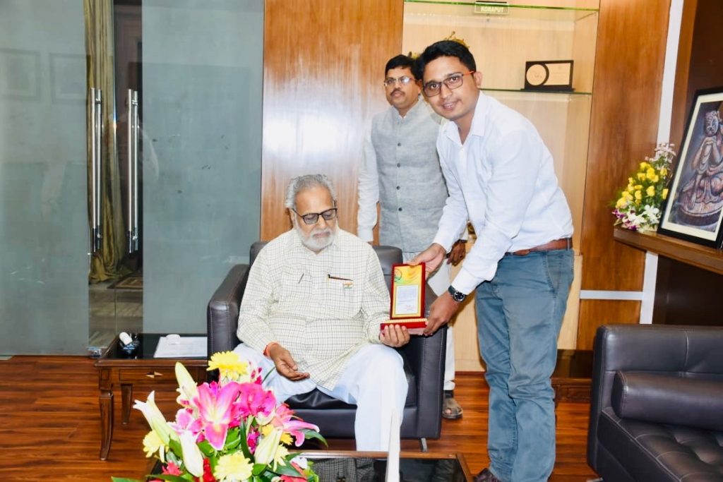 Sagar Pradhan receiving award from Governor of Odisha