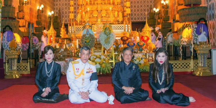 Members of the Thai royal family with Princess Ubolratana (L) and King Maha Vajiralongkorn (in white