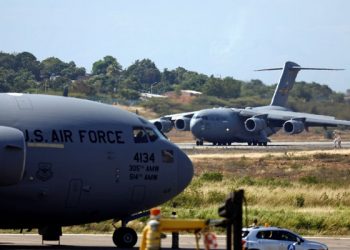 A second US Air Force plane carrying humanitarian aid for Venezuela taxis after landing at Camilo (AP)