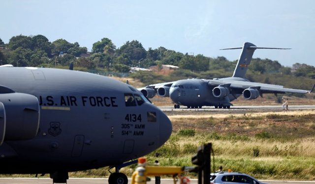 A second US Air Force plane carrying humanitarian aid for Venezuela taxis after landing at Camilo (AP)