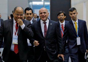 FILE PHOTO: Venezuela's Oil Minister and President of Venezuelan state-run oil company PDVSA Manuel Quevedo (C) arrives to attend the Petrotech conference in Greater Noida, India, February 11, 2019. (REUTERS)