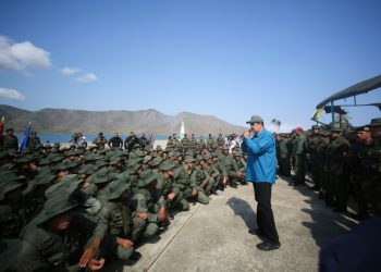 Venezuela's President Nicolas Maduro speaks to troops at a naval base, a day after a top general sided with the opposition