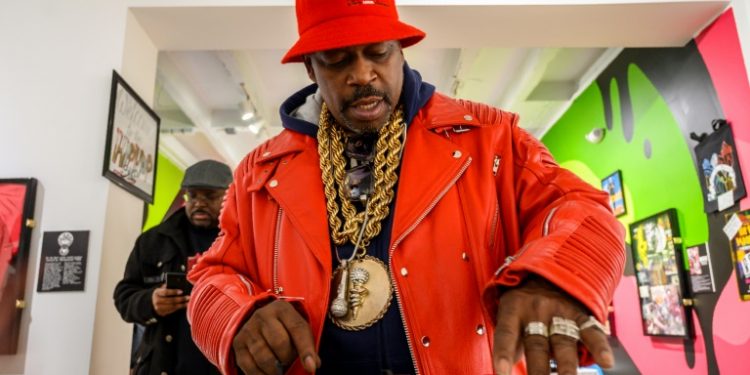 Curtis Fisher, also known as Grandmaster Caz, checks out the memorabilia at the Hip-Hop Museum Pop-Up Experience in Washington in January 2019 (AFP)