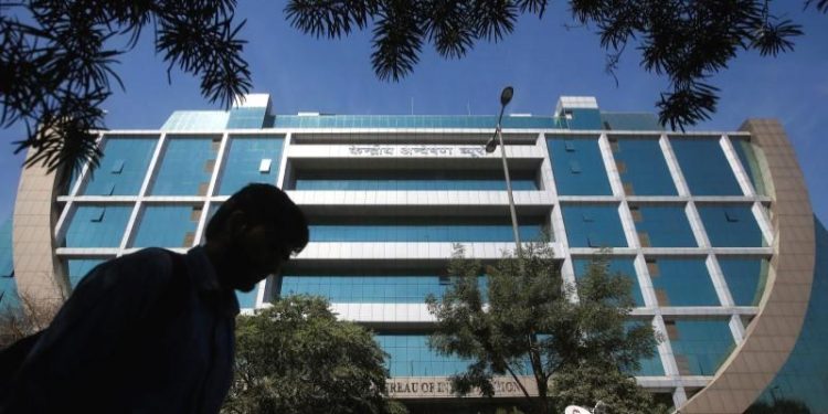 A man walks past India's Central Bureau of Investigation (CBI) headquarters building in New Delhi, India, March 6, 2018. (REUTERS)