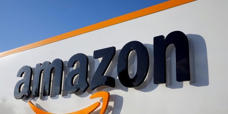 The logo of Amazon is seen at the company logistics centre in Boves, France, August 8, 2018. (REUTERS)