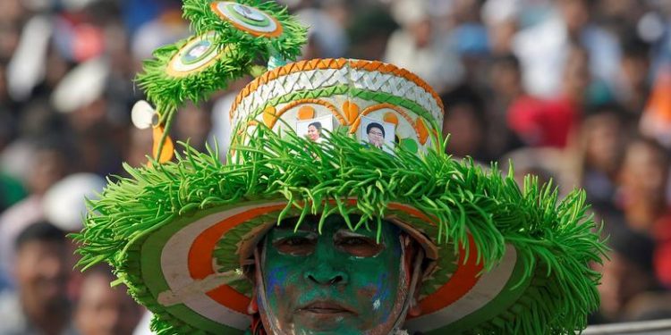 A supporter listens to speakers during "United India" rally attended by the leaders of India's main opposition parties ahead of the general election, in Kolkata, India, January 19, 2019. (REUTERS/Rupak De Chowdhuri)