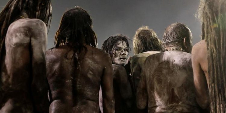 Naga Sadhus or Hindu holy men leave after taking a dip during the first "Shahi Snan" (grand bath) during "Kumbh Mela" or the Pitcher Festival, in Prayagraj, previously known as Allahabad, India, January 15, 2019. (REUTERS/Danish Siddiqui)