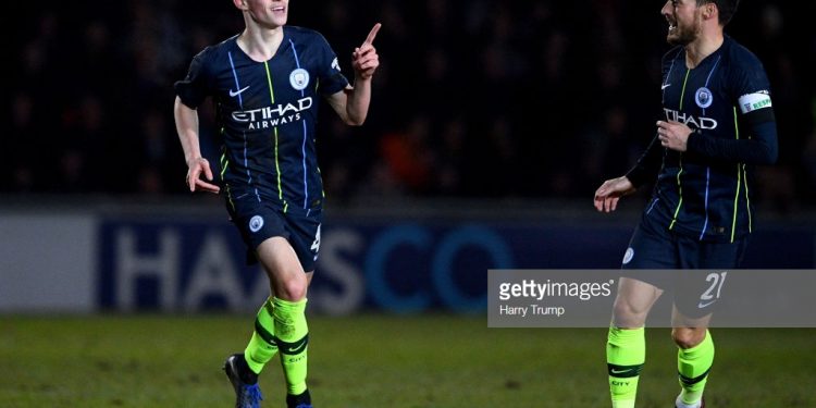 Manchester City’s Phil Foden celebrates after scoring his second of the night against Newport County, Saturday 